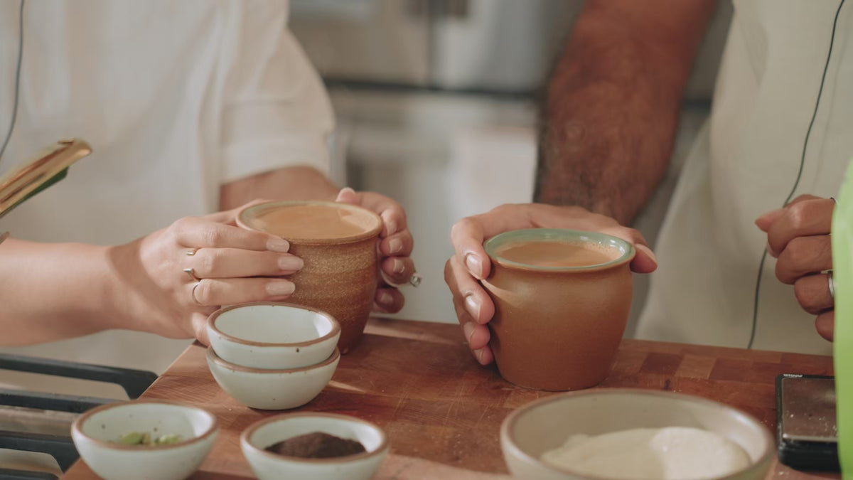 karak chai being poured in our cafe